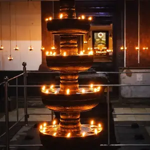 Five-flame deepam lamp inside the temple sanctum